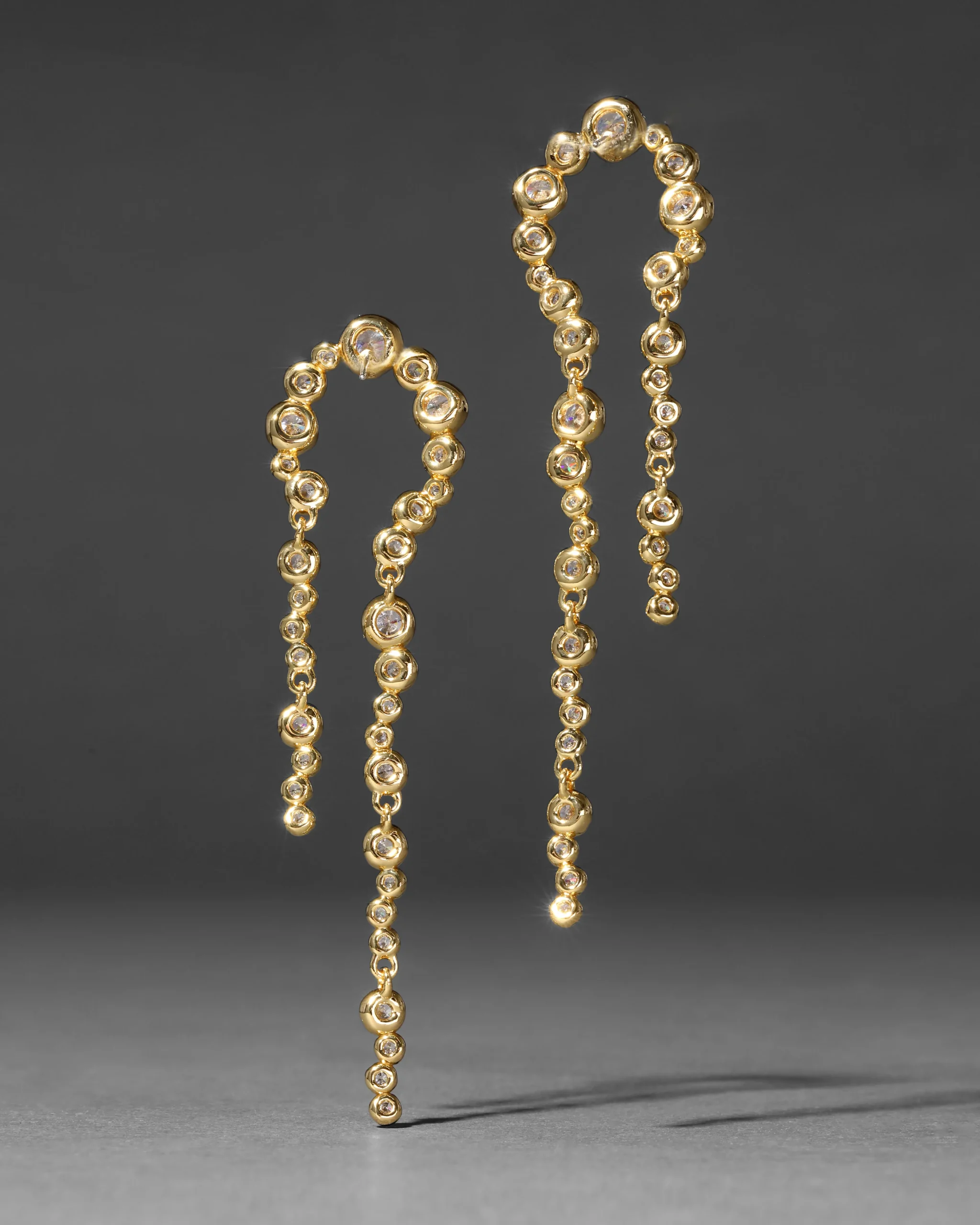 Asterales Gold Arched Long Earring